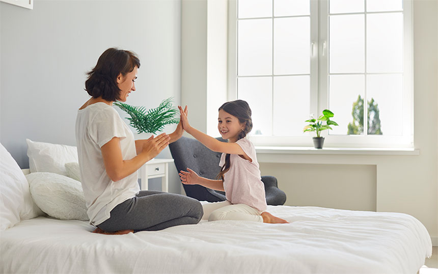 Mom and daughter enjoying clean indoor air and environment family enjoying the clean indoor air